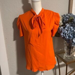 BTFBM blouse in bright orange with tie neck sz S